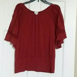 Beautiful rust red color top with sleeve detail